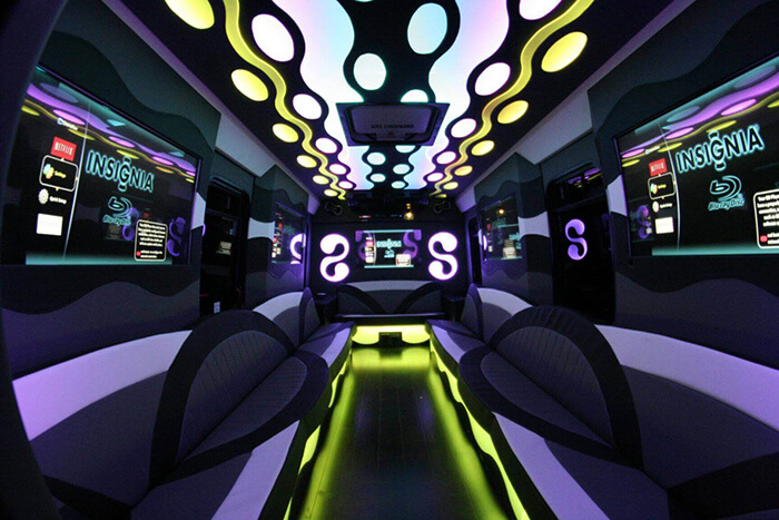 Limo bus with multiple flat screen TVs