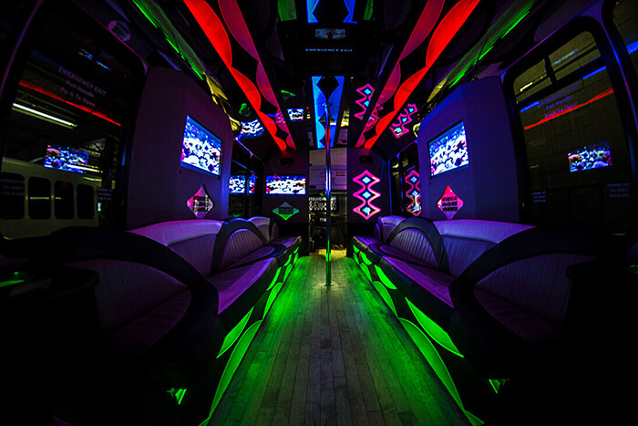 Magic party bus to groups with overhead bins to luggage storage